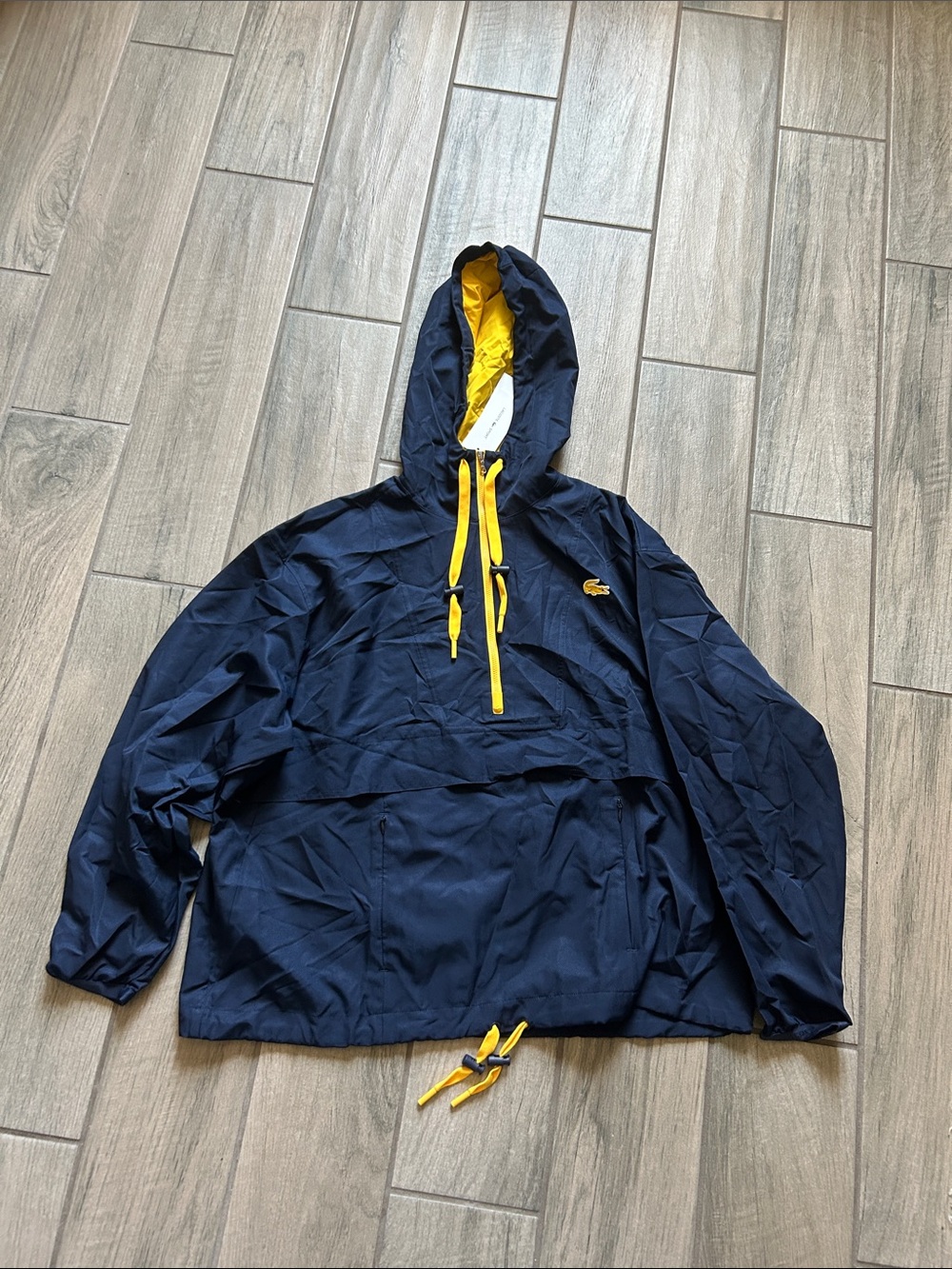 Lacoste Navy Windbreaker with Yellow Accents